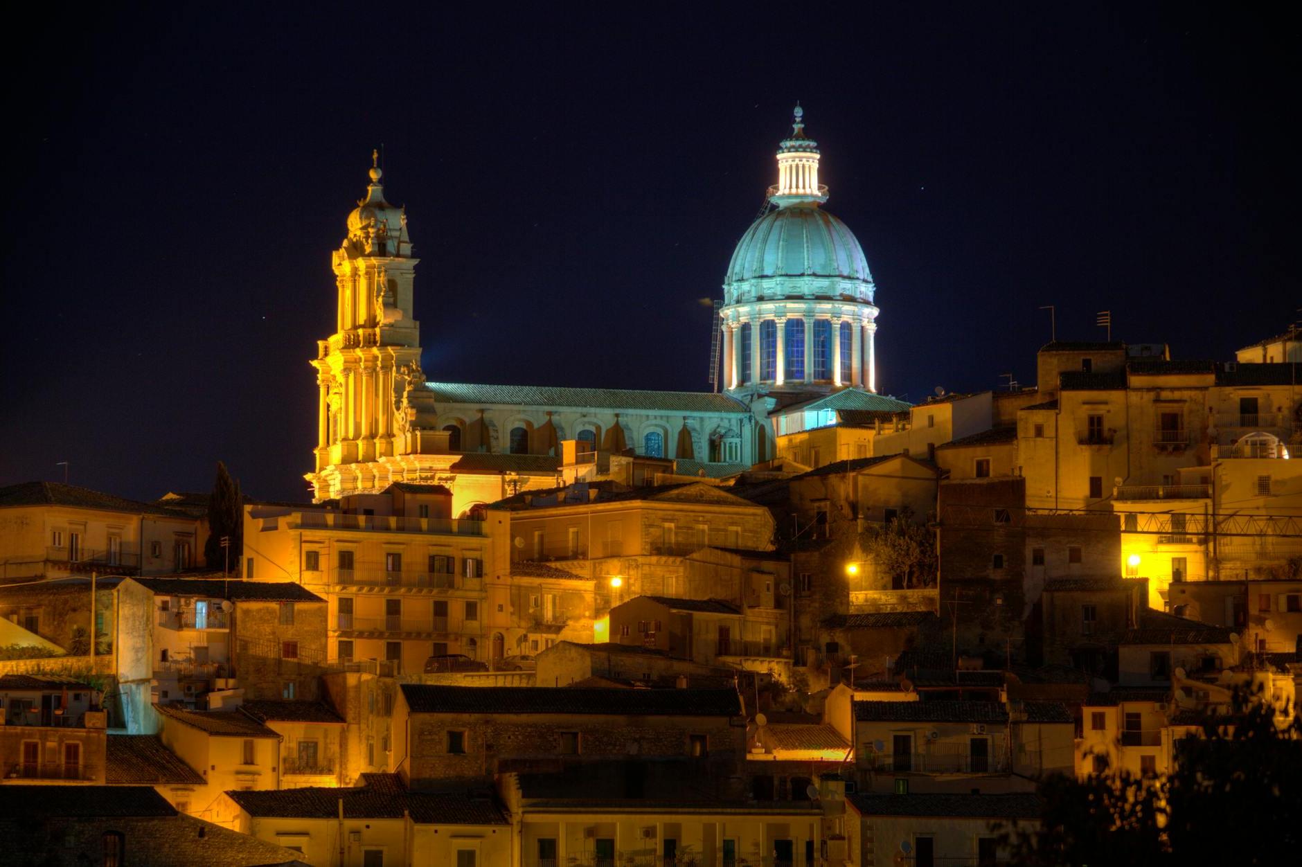 Historic Ancient Baroque Cathedral Behind Buildings