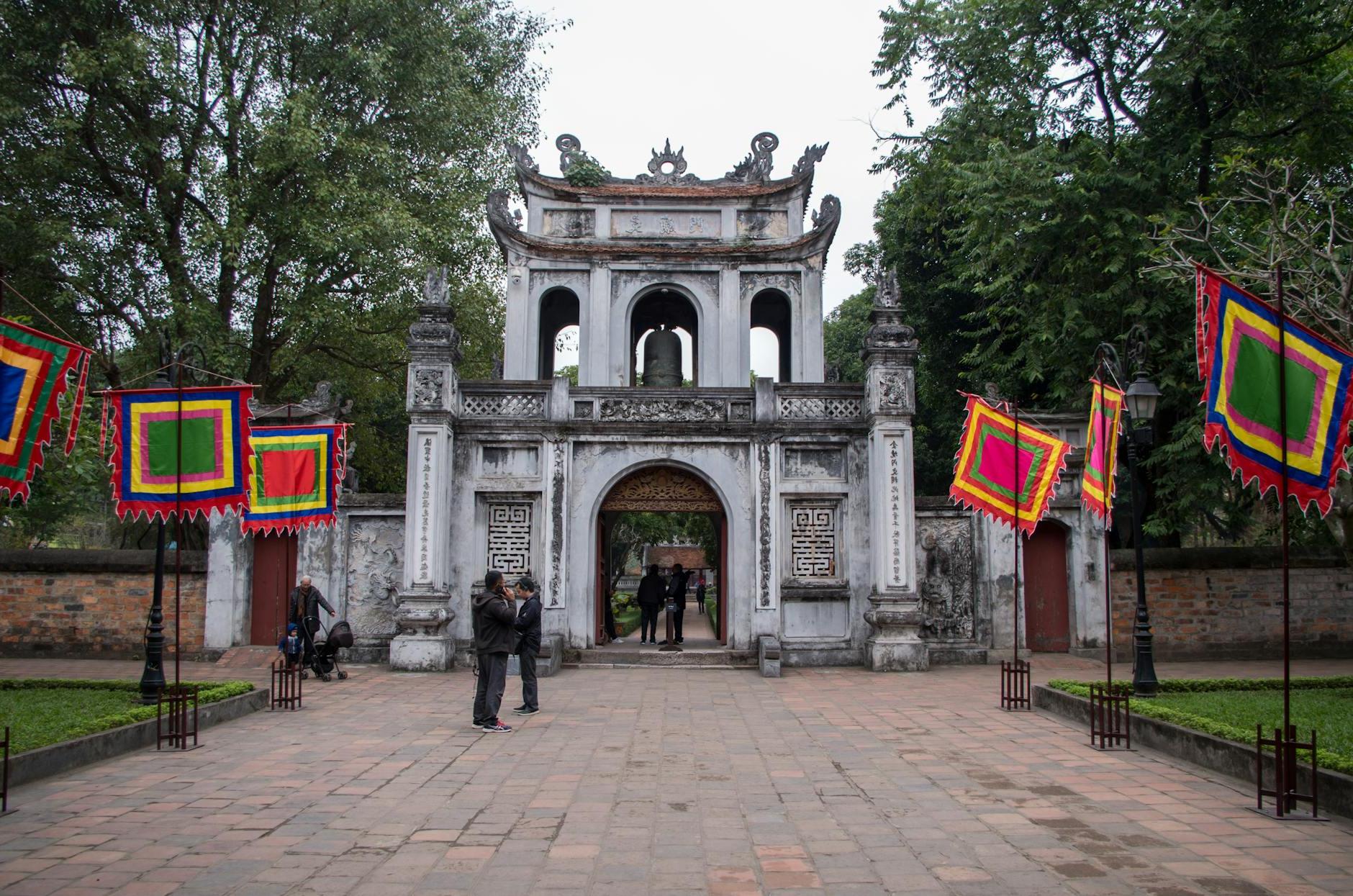 Tourists at the Main Gate of the Temple of Literature in Hanoi 