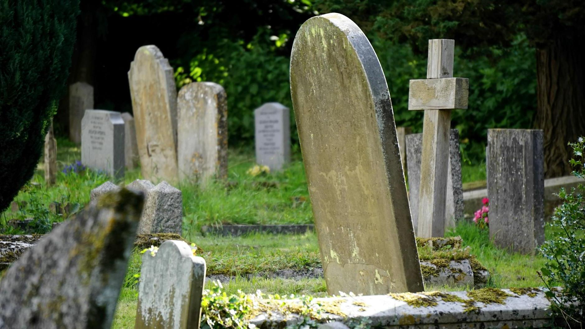 Close-up Photography of Concrete Tombstones