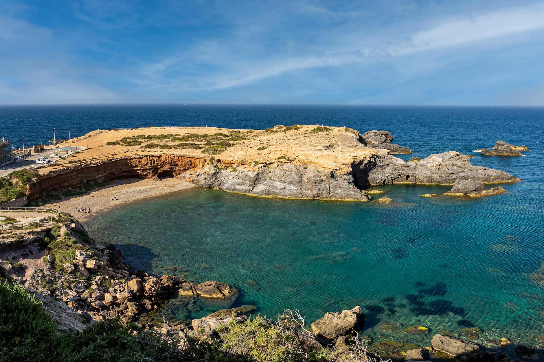 Brown Rock Formation on the Sea