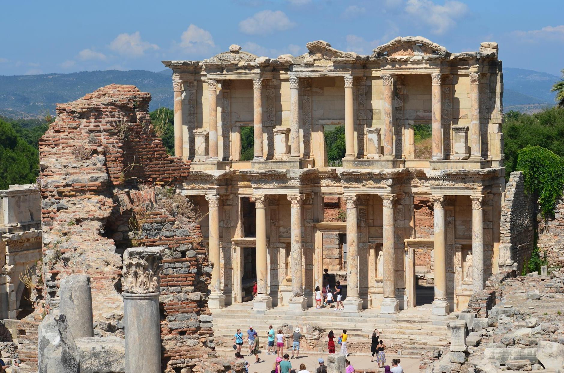 People Standing Outside the Historic Library of Celsus in Turkey