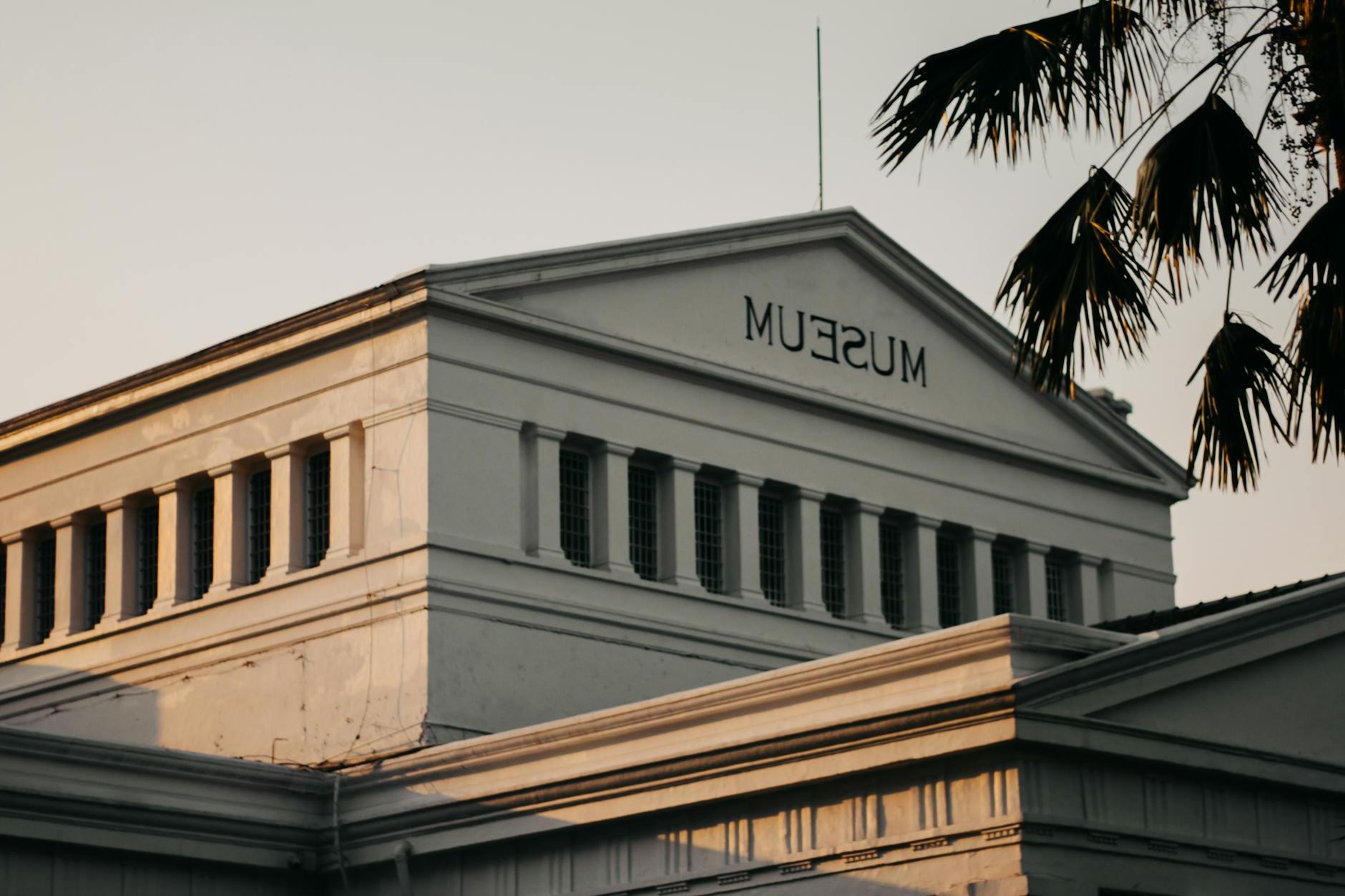 Low Angle Photo of White Museum during Golden Hour