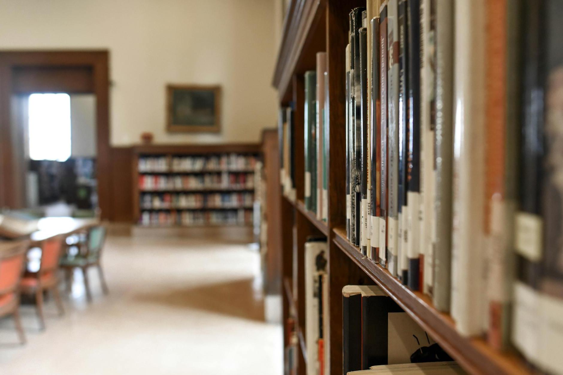 Selective Focus Photography of Bookshelf With Books