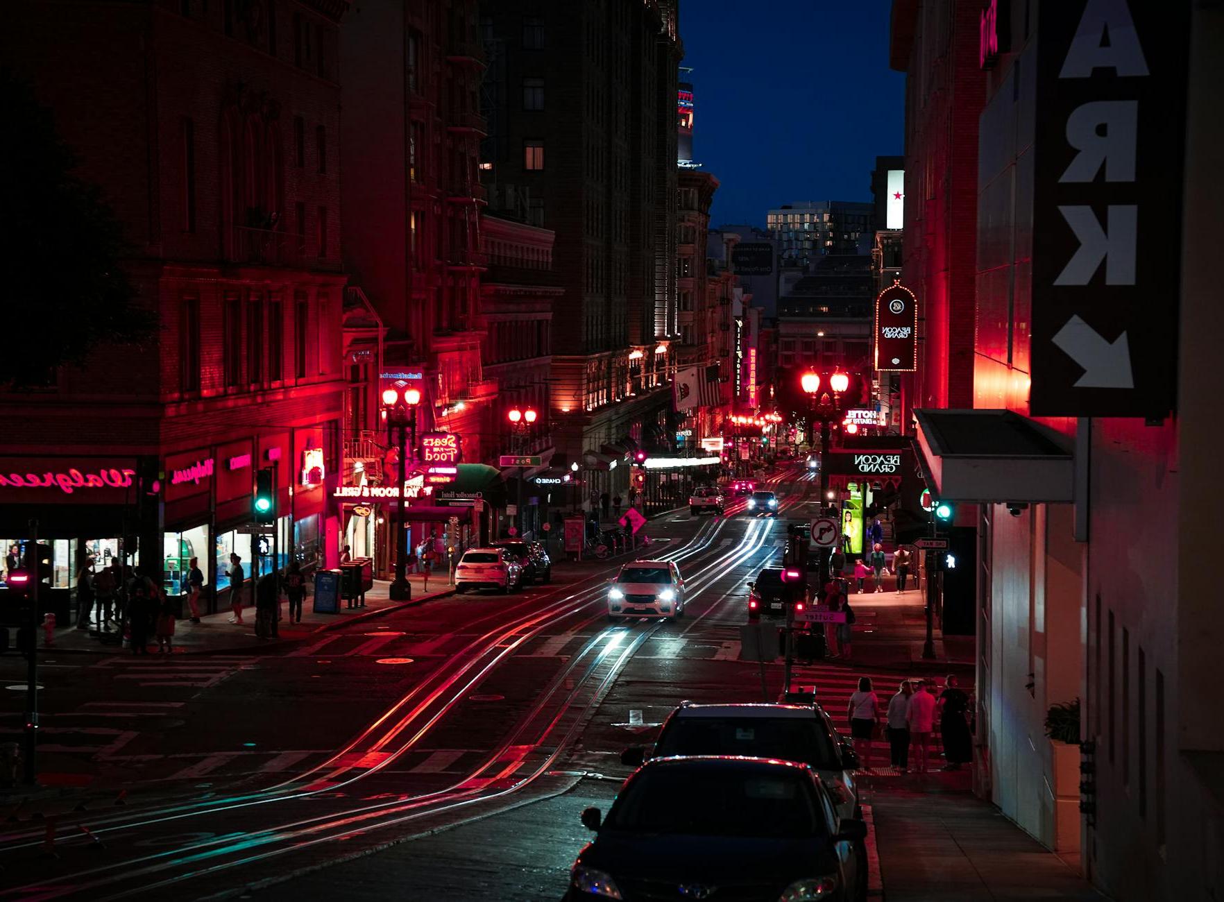 People Walking on the Street during Night Time