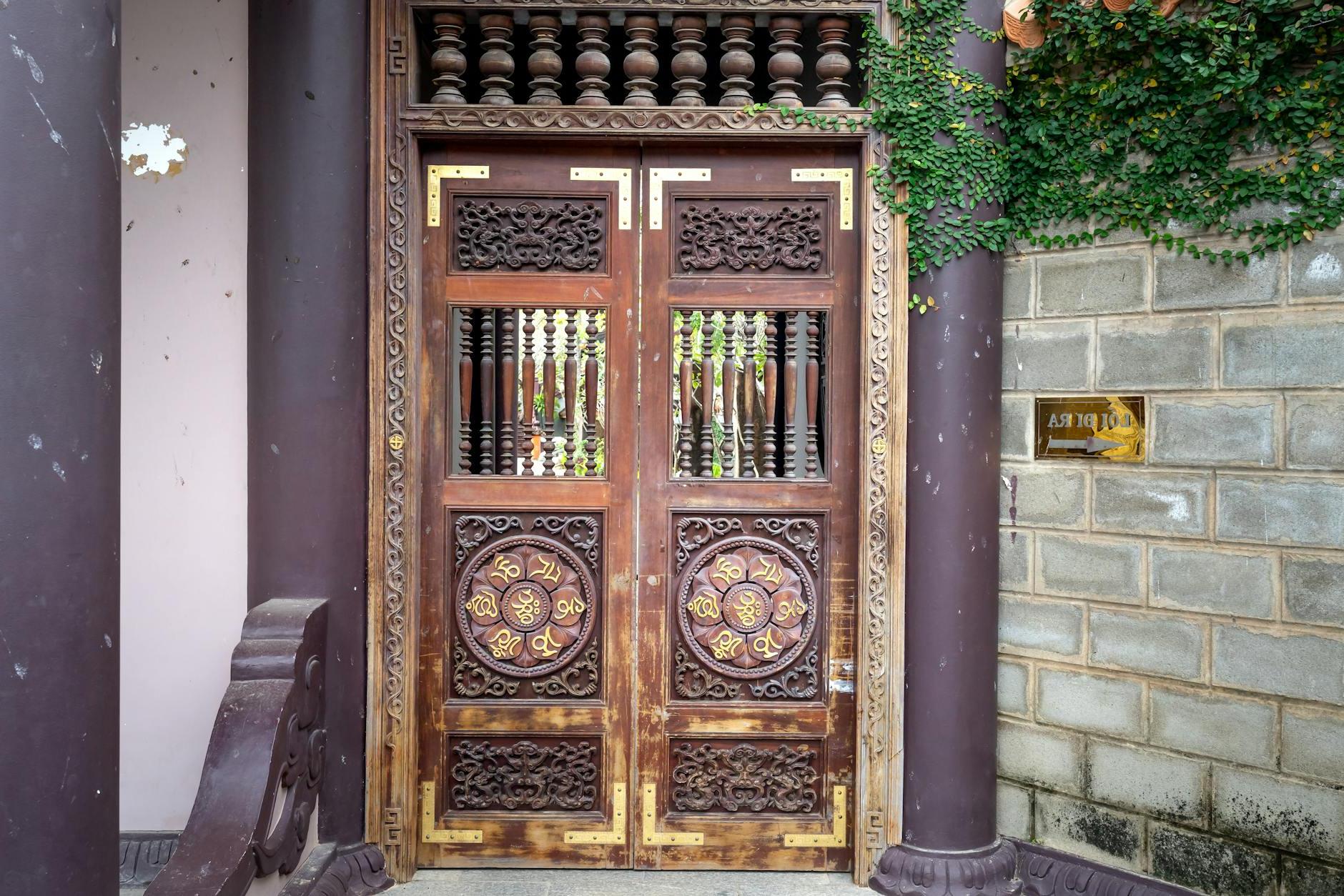 Building Entrance with Ornamental Wooden Door
