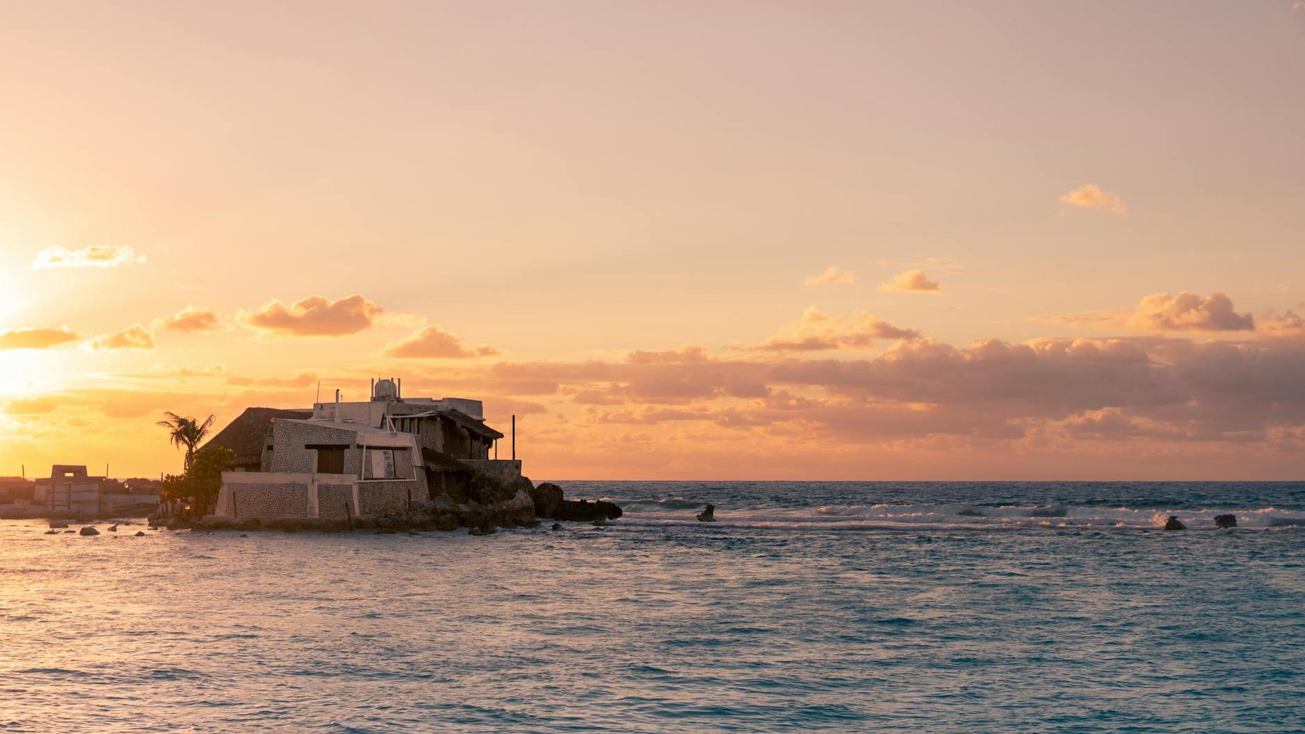 House in Isla Mujeres Bay Mexico at Sunset