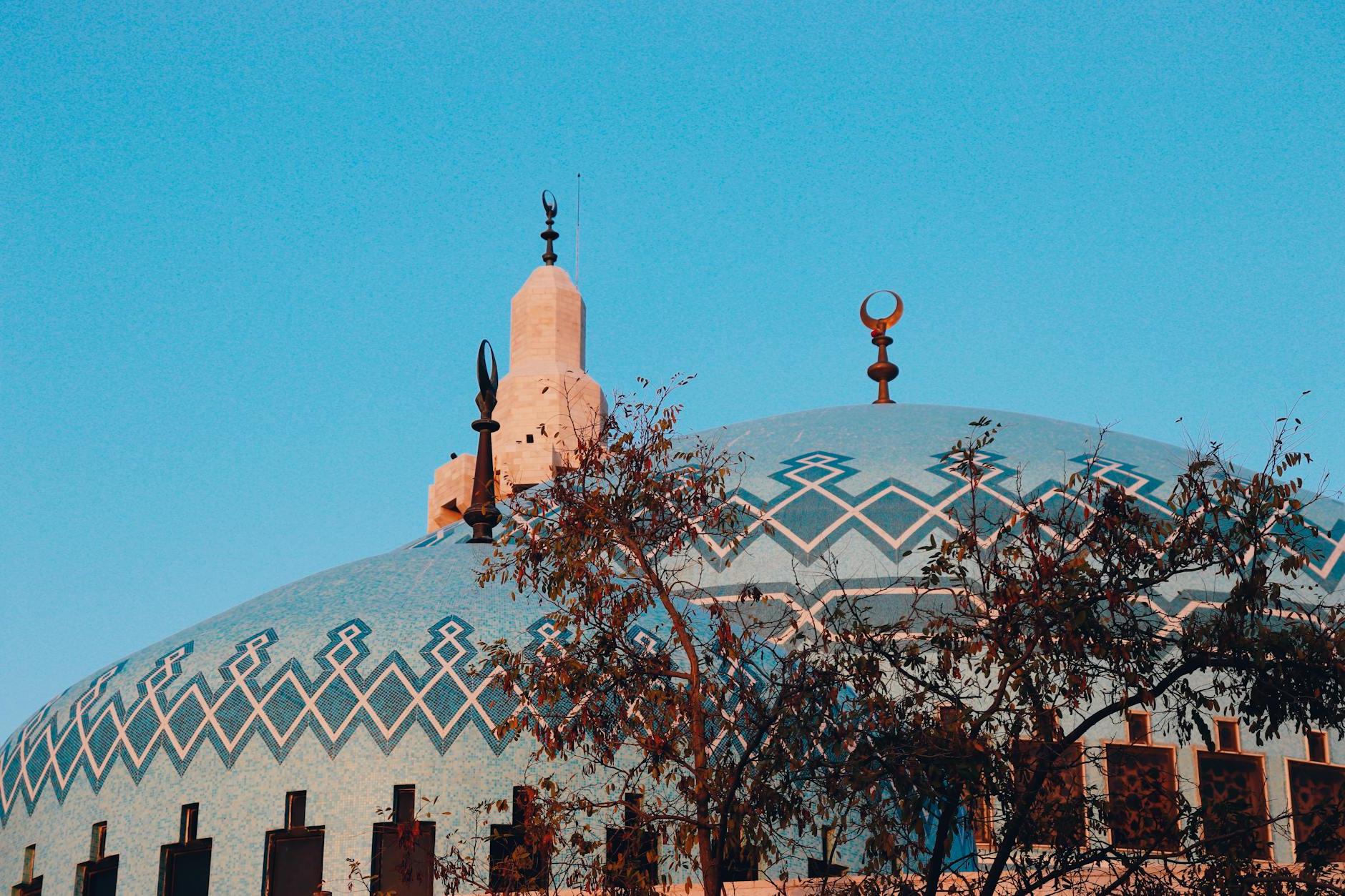 King Abdullah I Mosque Dome in Amman, Jordan Under Blue Sky