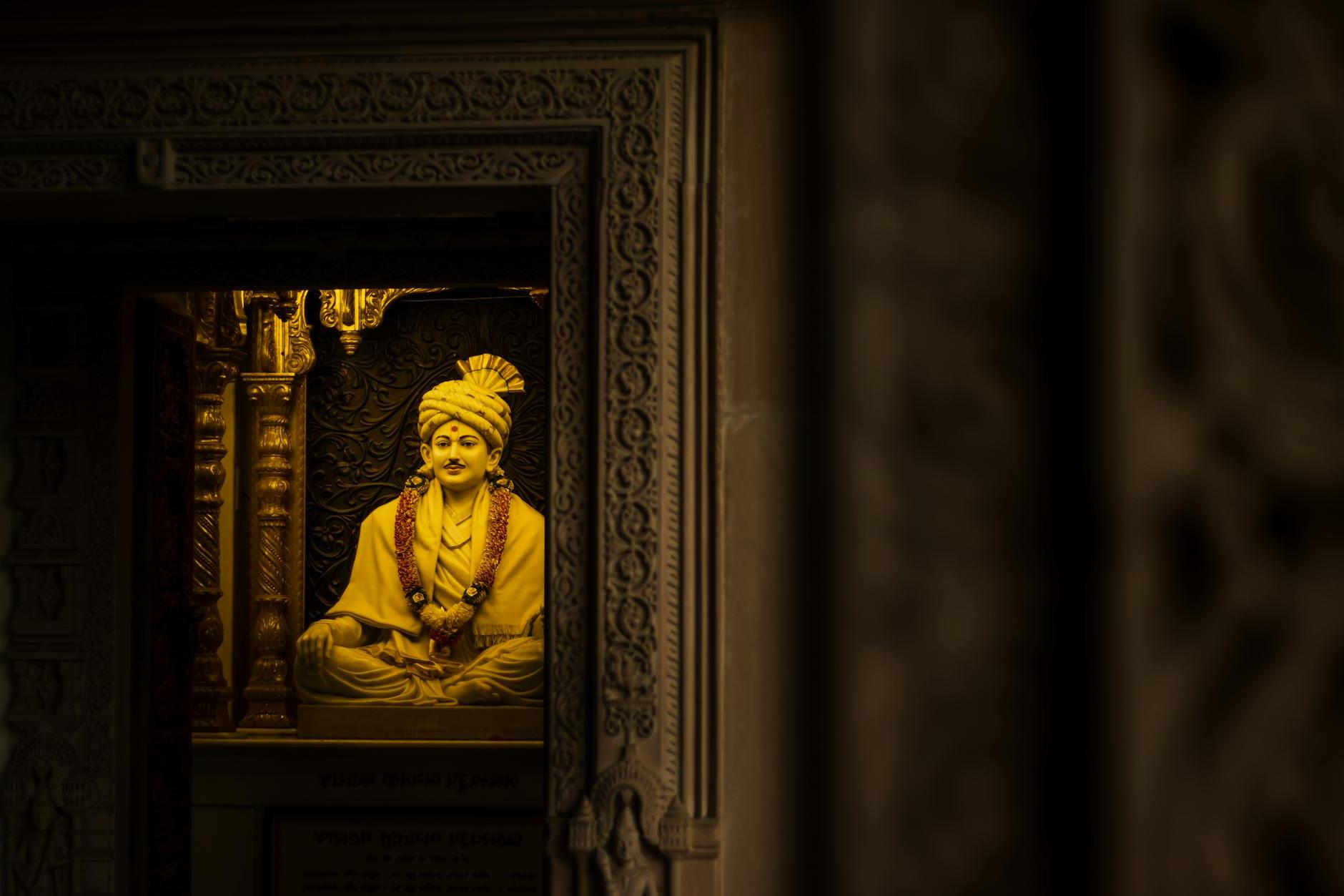 Hindu God Statue Reflection in Mirror in Museum