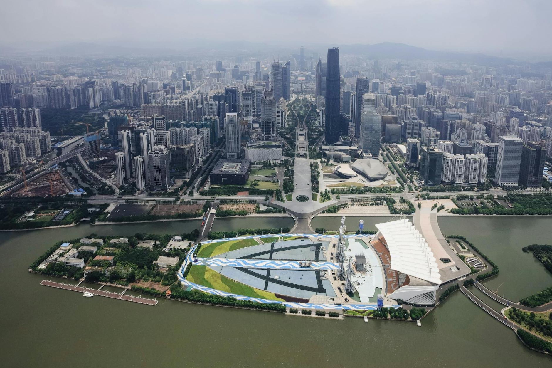 Island on River and Skyscrapers near in Guangzhou