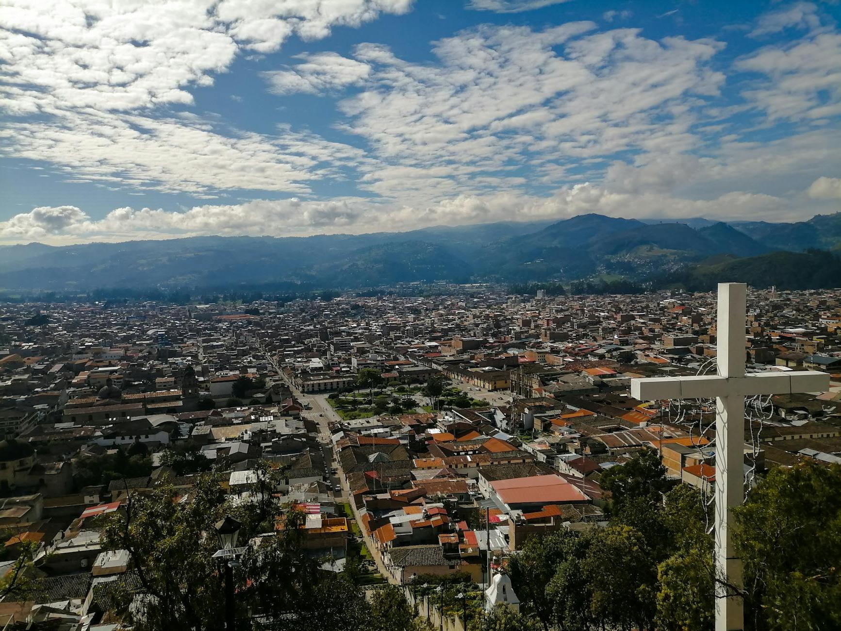 Clouds over Quetzaltenango with a Cross in the Foreground