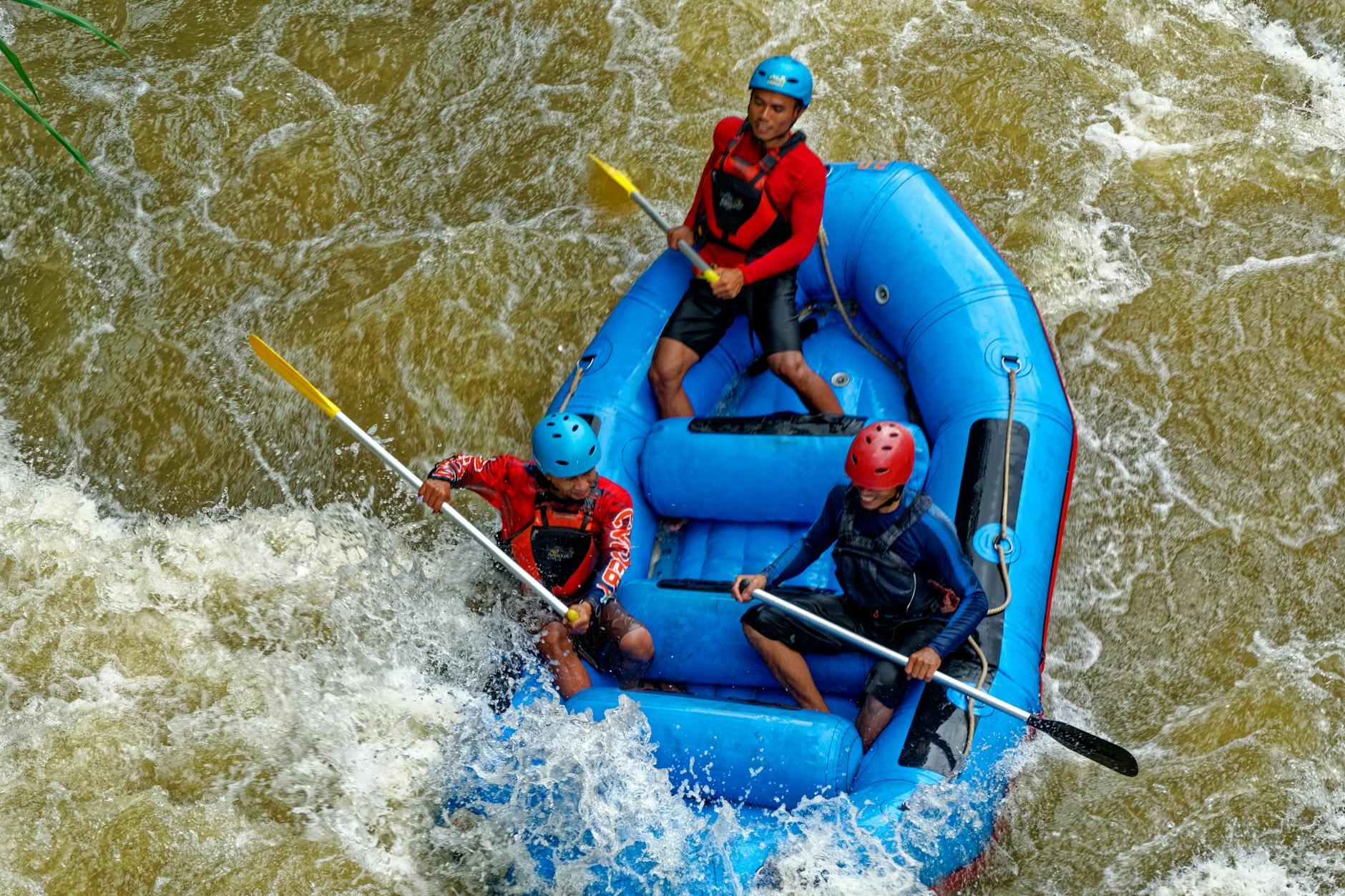 Group of People Rafting