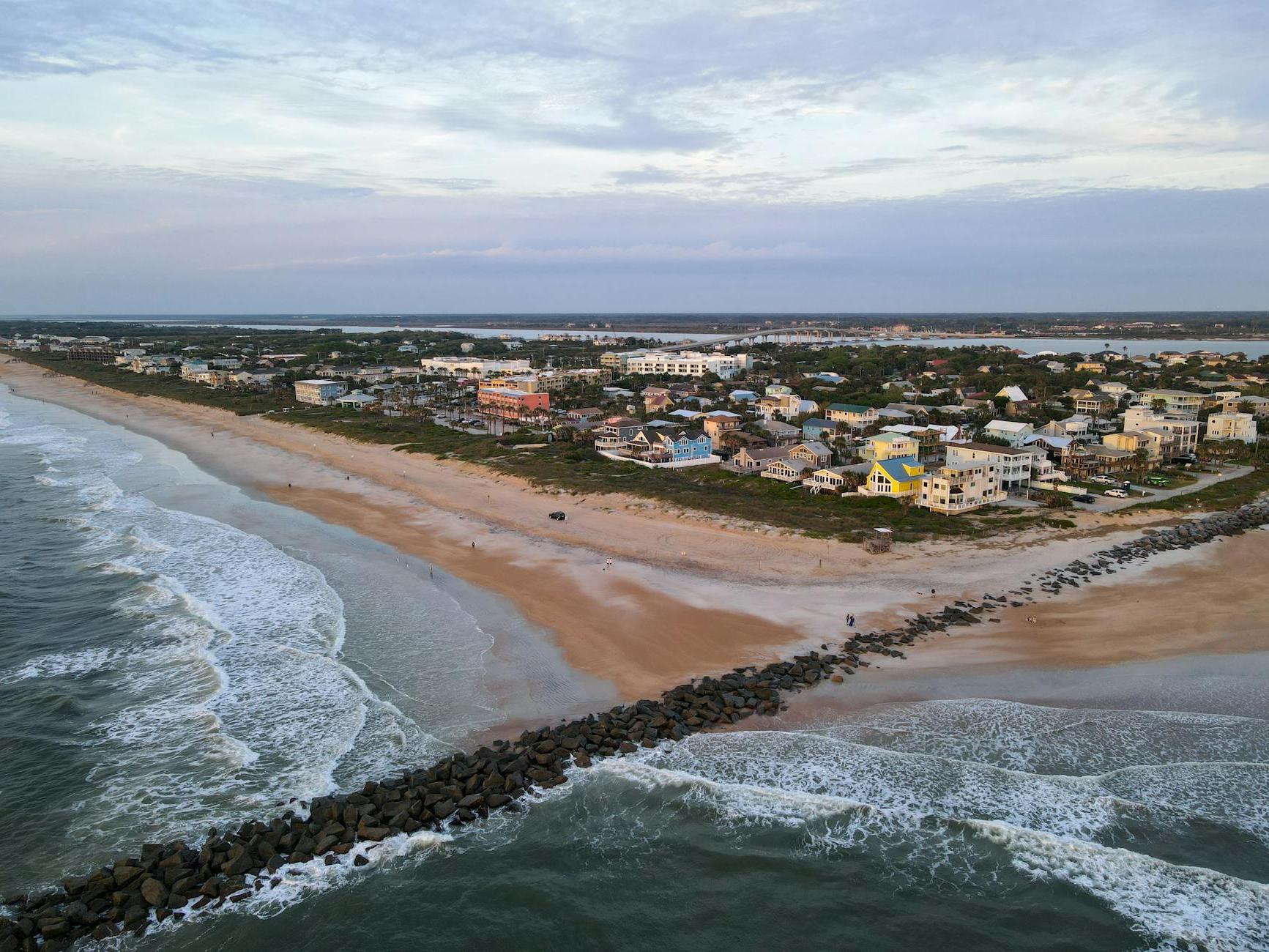 An aerial view of a beach and ocean