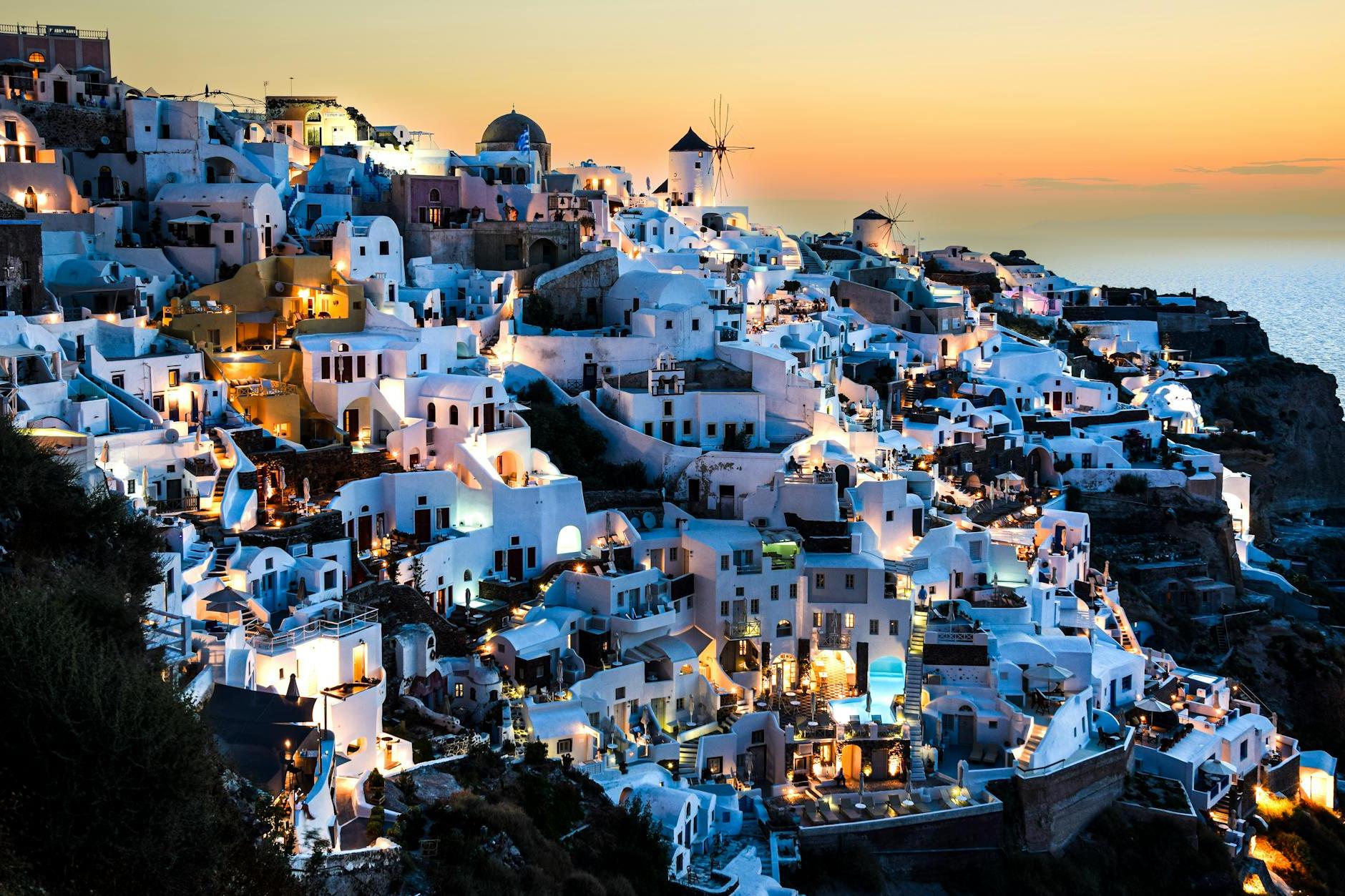 Seaside Village of Oia on a Mountainside at Dusk