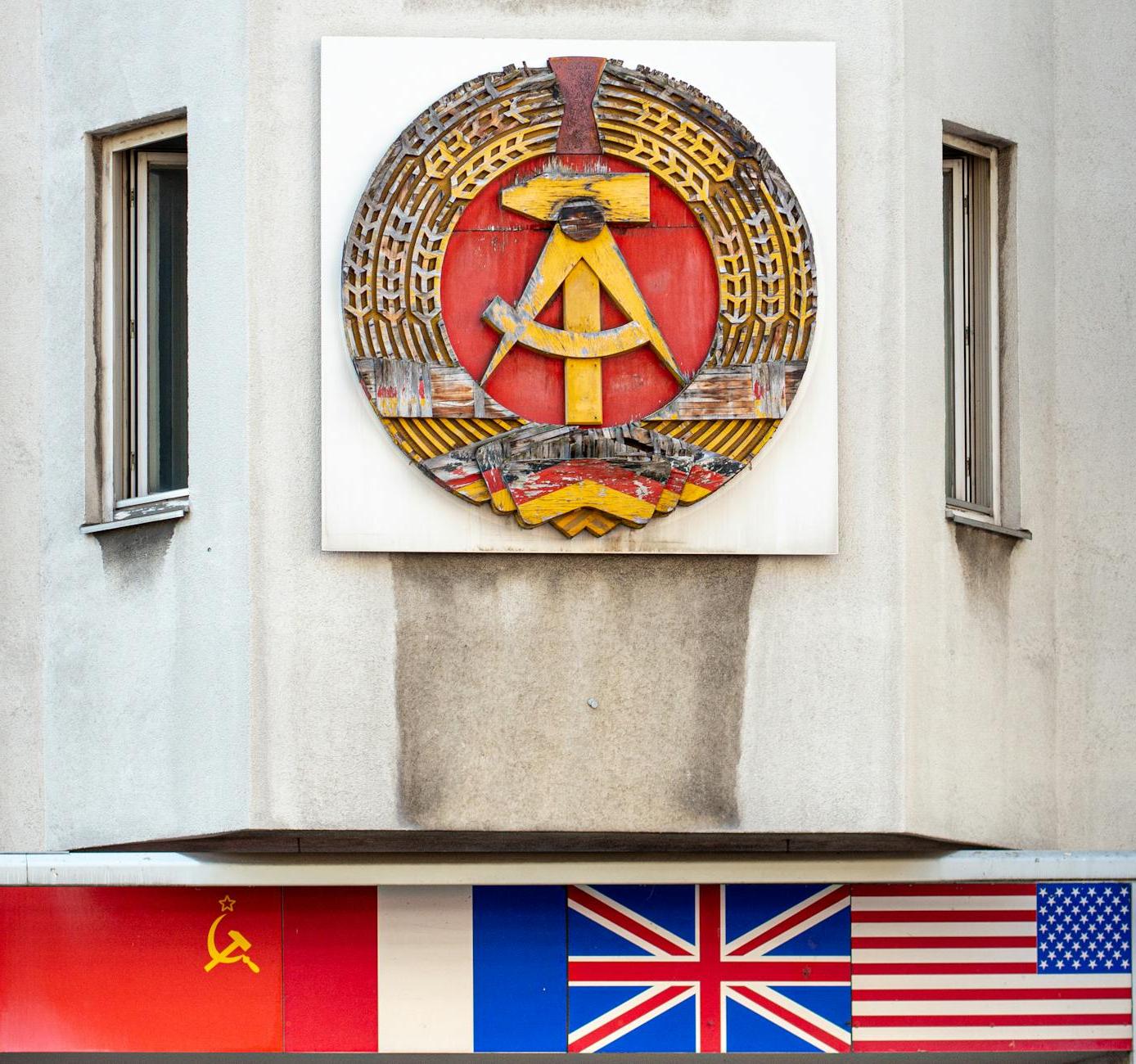 National Emblem of East Germany at Checkpoint Charlie in Berlin, Germany