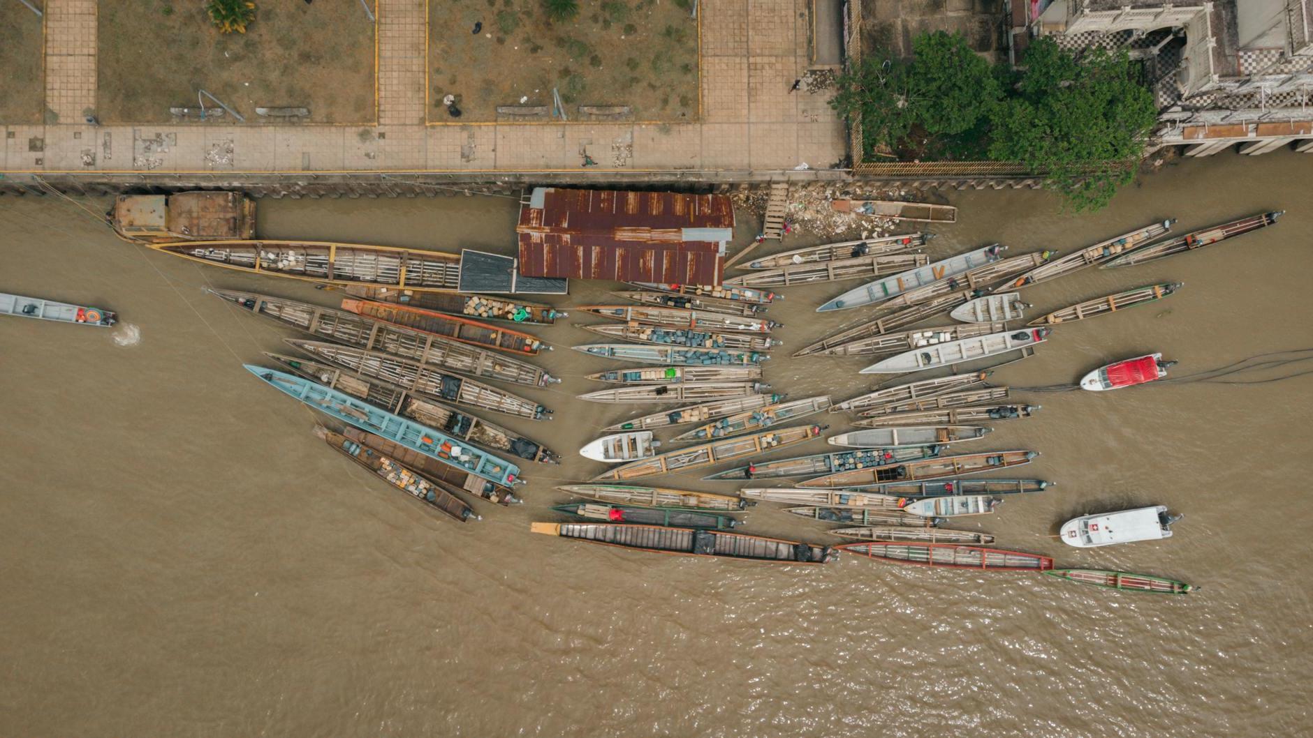 Punting Boats Moored by Waterfront