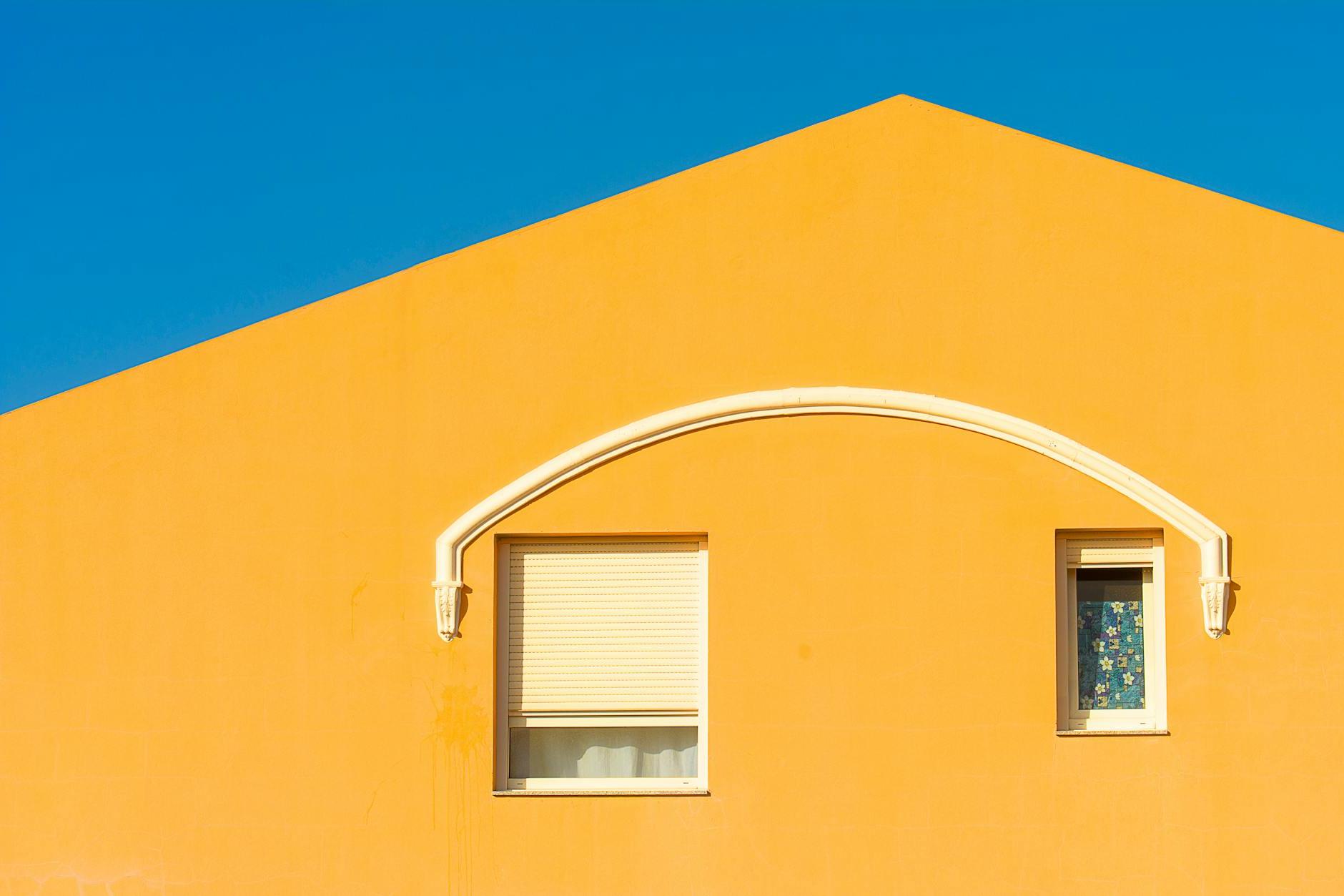 Yellow Gable Wall With Windows