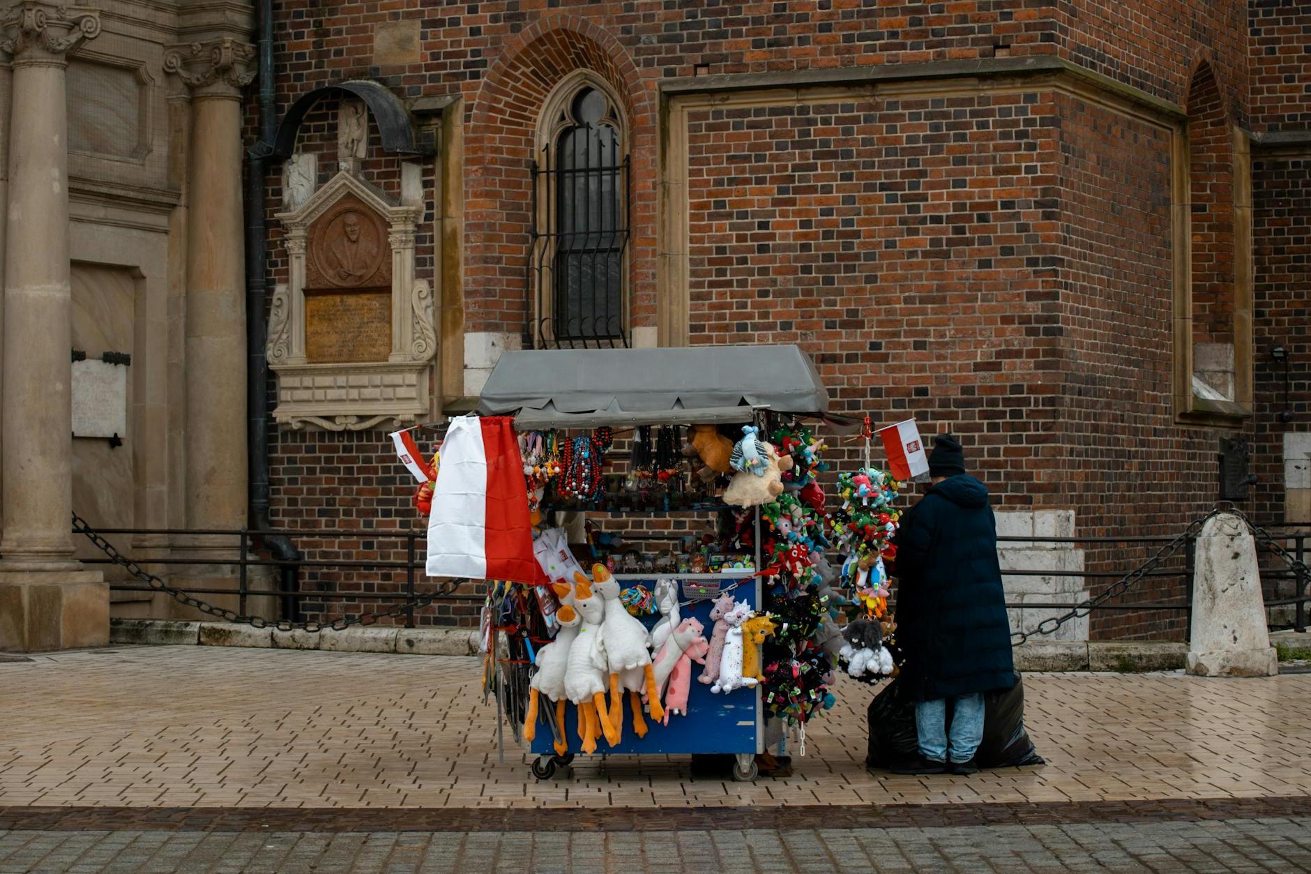 Merchant with Cart by Saint Marys Basilica in Krakow