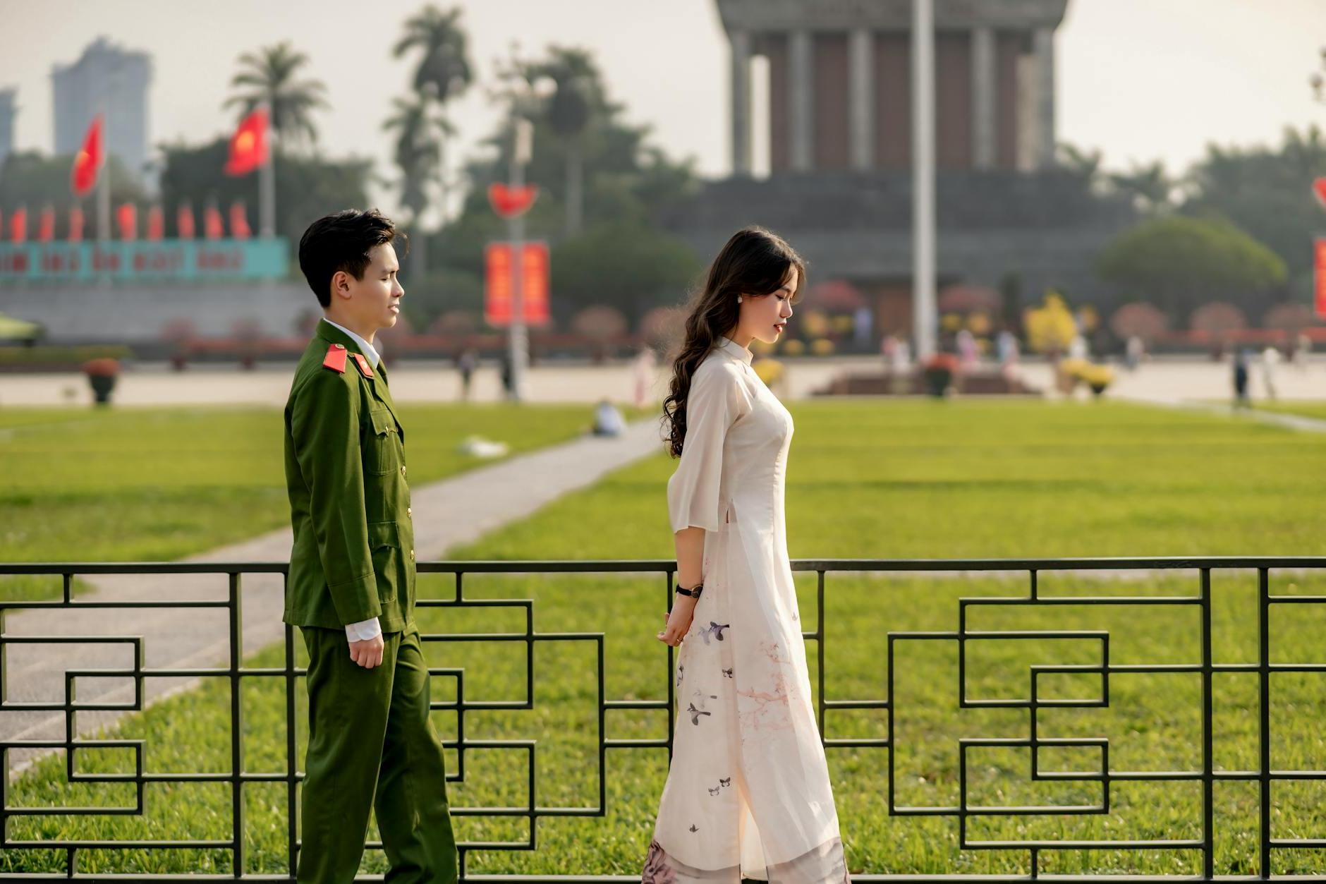 Young Couple Walking in Front of the Ho Chi Minhs Mausoleum