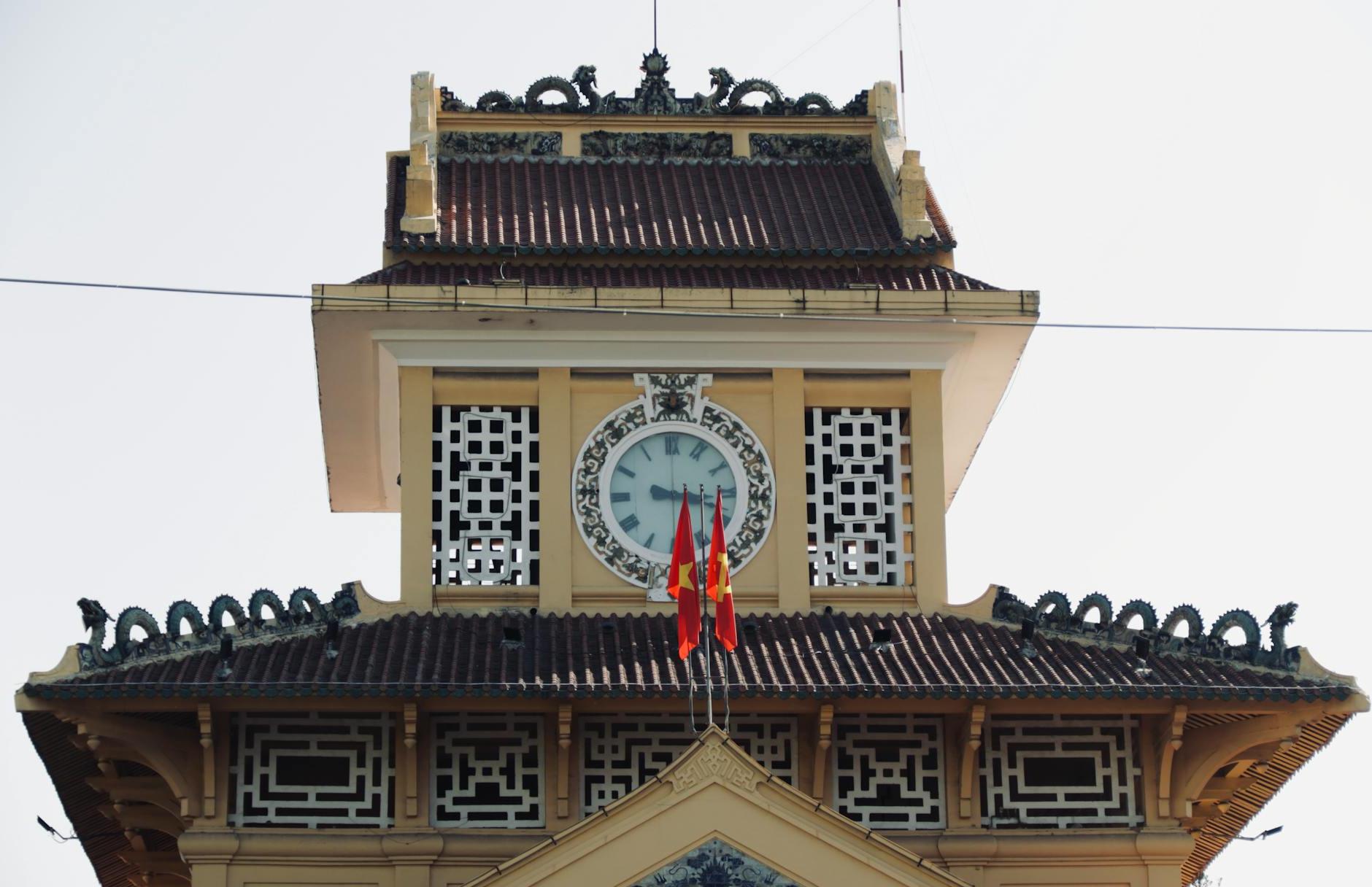 Close-up of the Clock Tower of Binh Tay Market in Ho Chi Minh City, Vietnam 