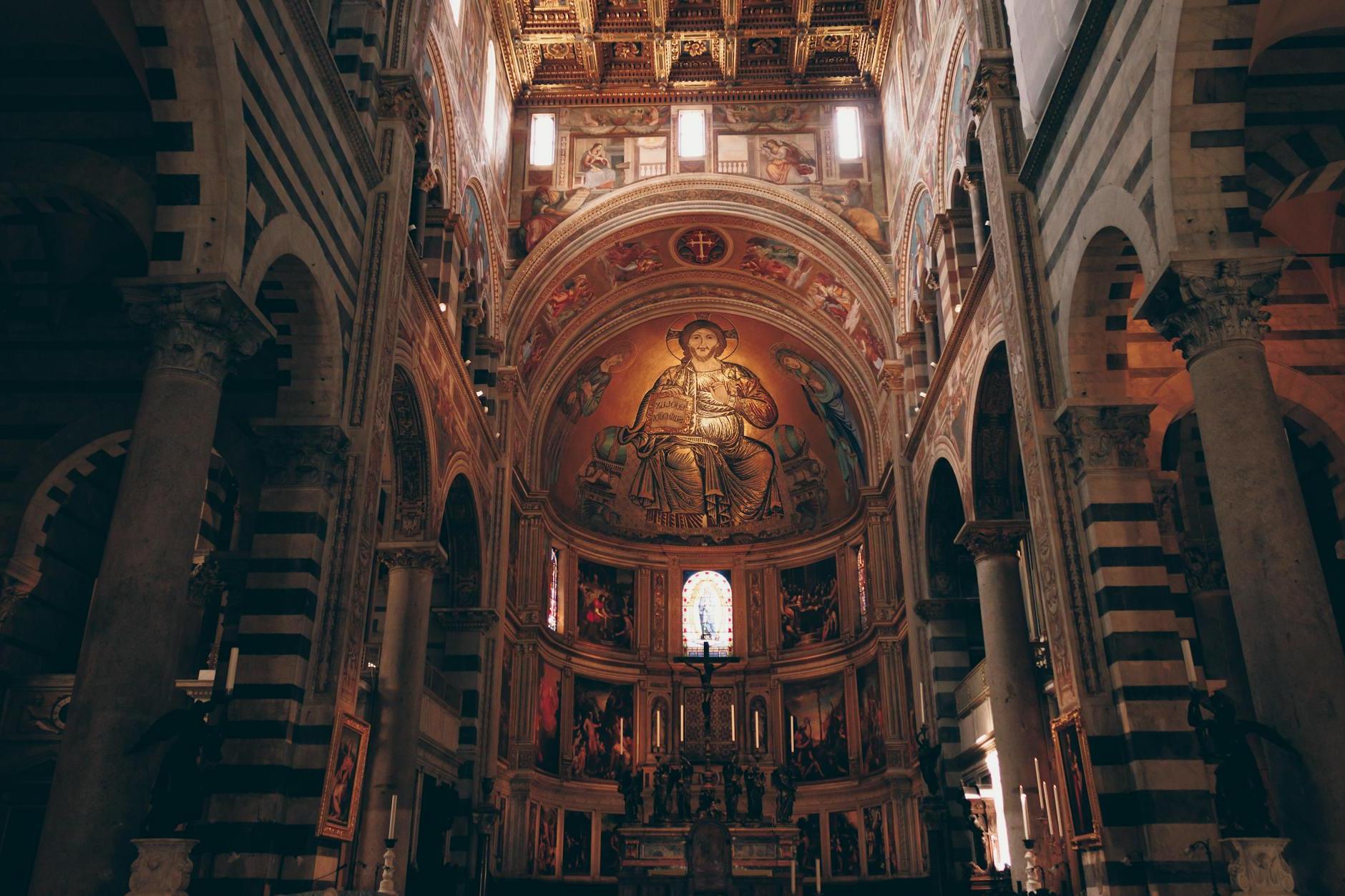 The inside of a cathedral with a large altar