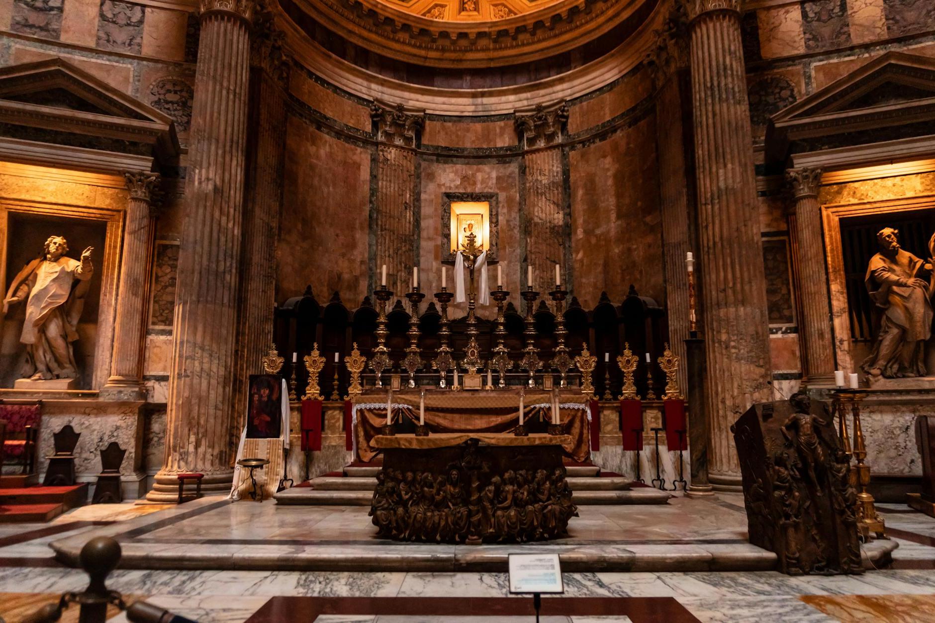 The interior of a church with a large altar