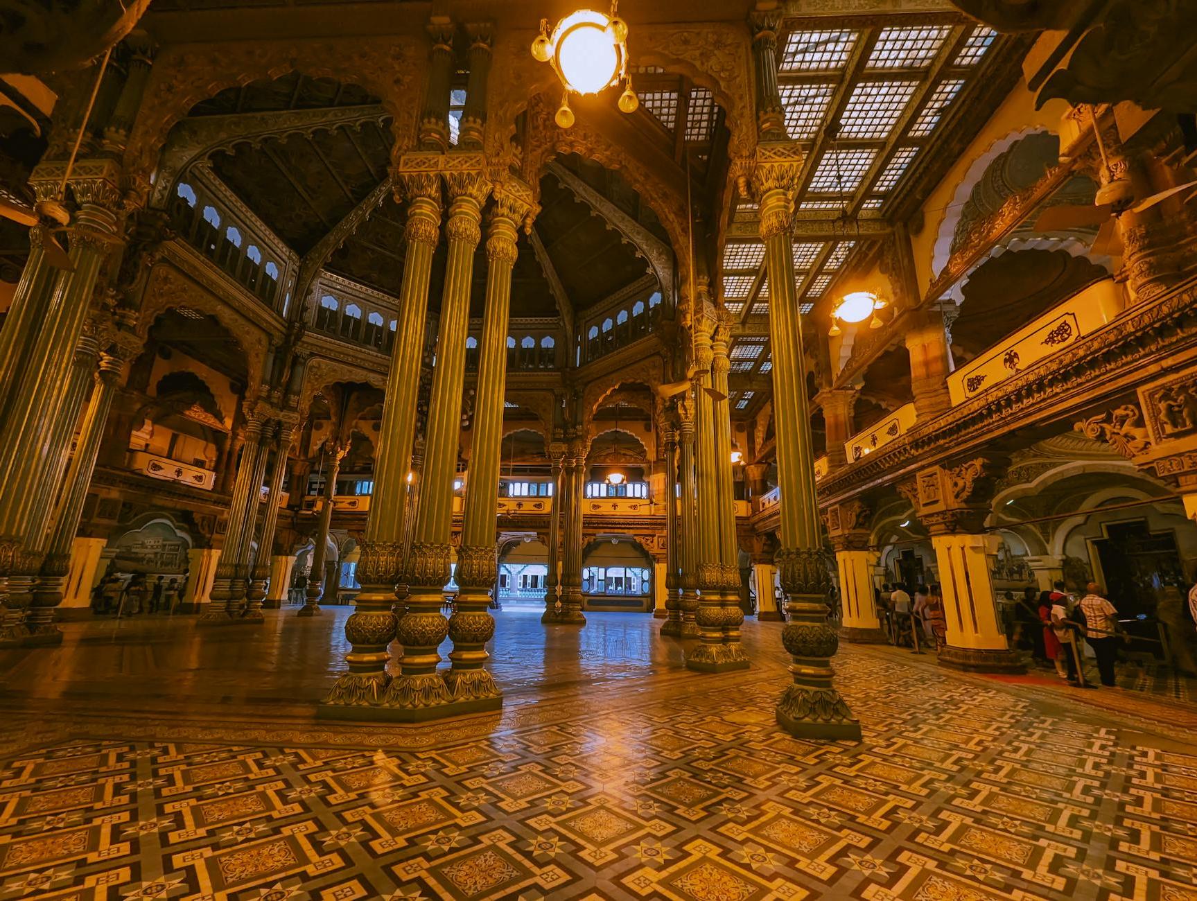 The inside of a building with columns and arches