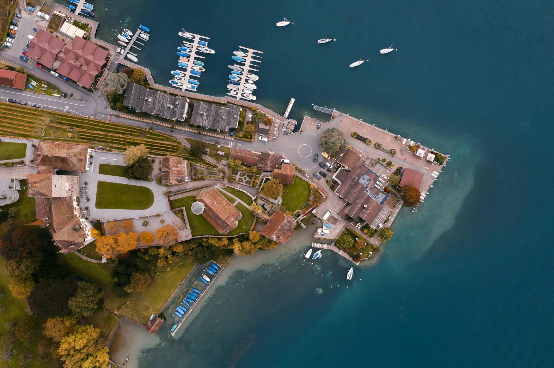 Aerial view of a small town with boats and houses