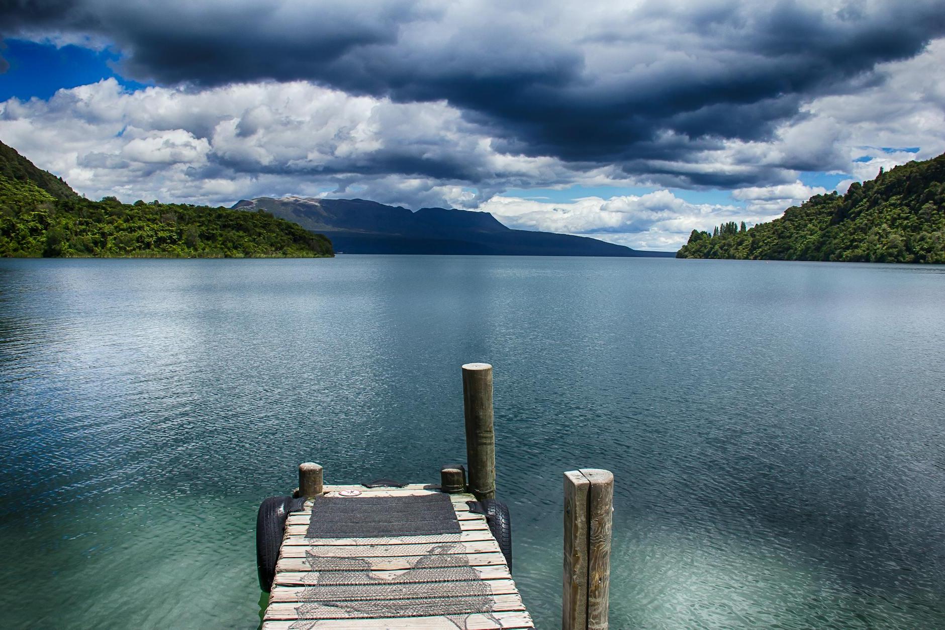 Brown Wooden Dock on Body of Water