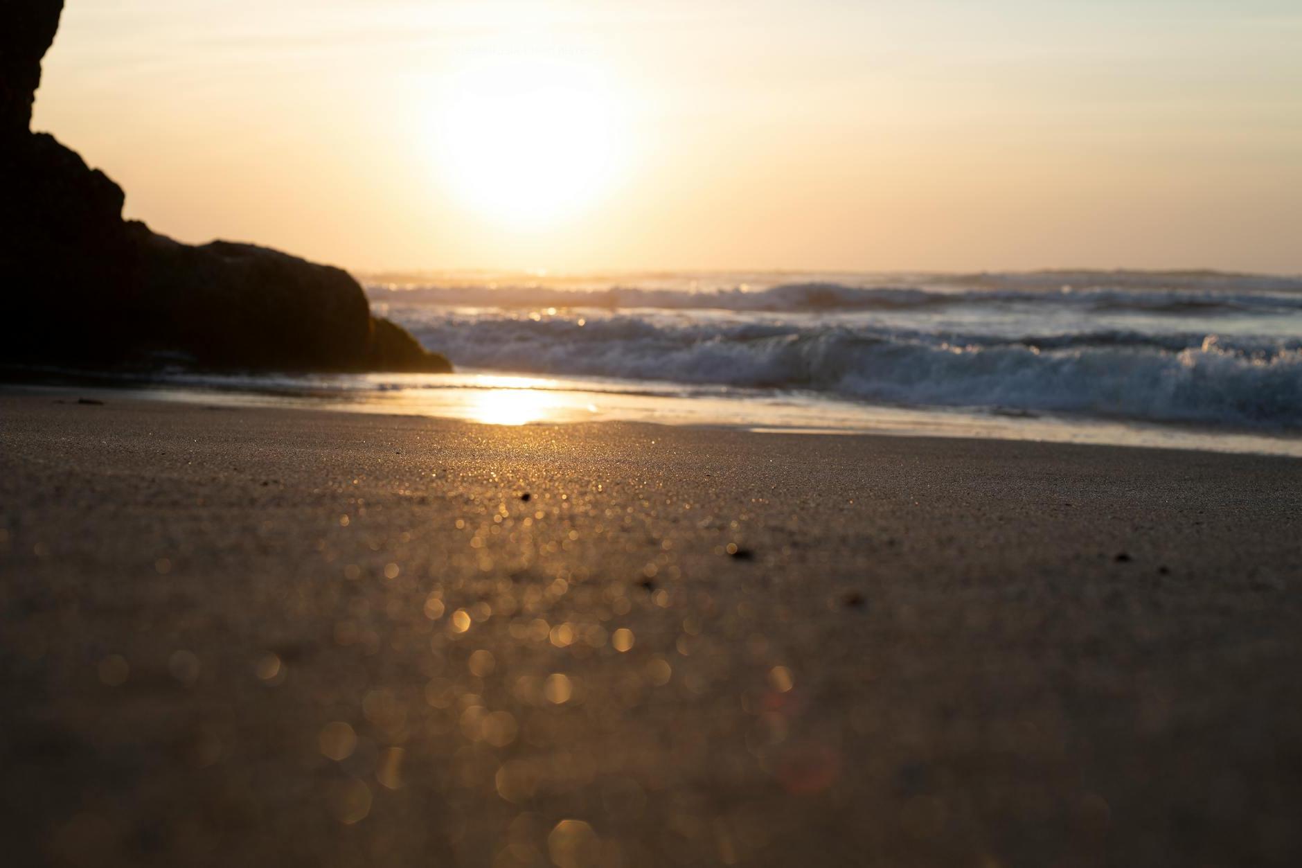 Scenic View Of Beach During Golden Hour