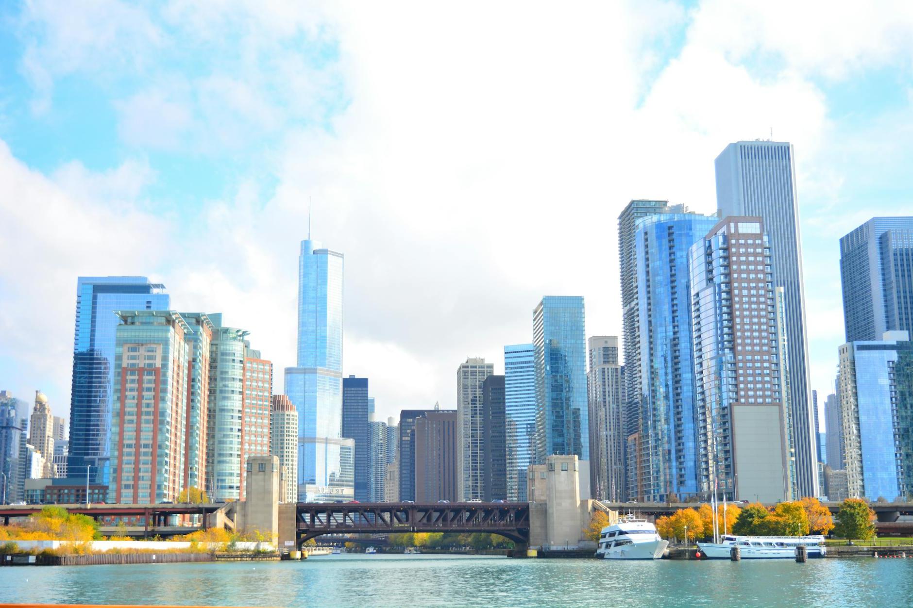 City at Waterfront Against Cloudy Sky