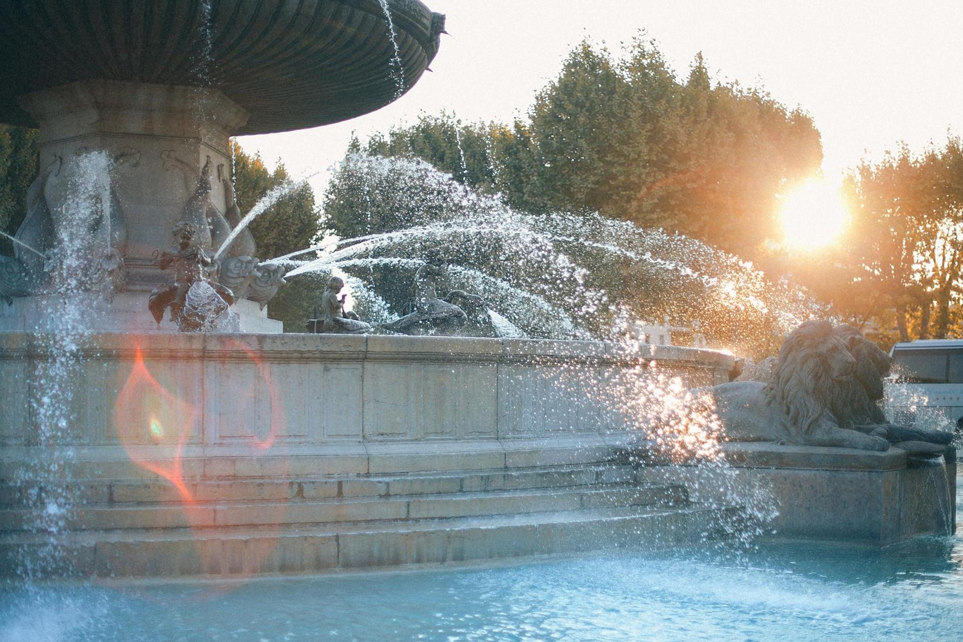 Ornamental fountain in sunny park