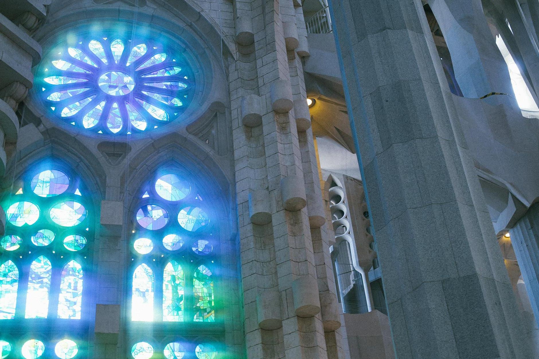 Low angle of old catholic basilica with stained glass windows named Sagrada Familia located in Barcelona in Spain