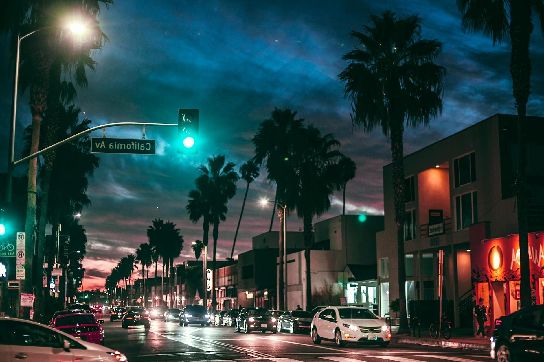 Busy city street in tropical town at night