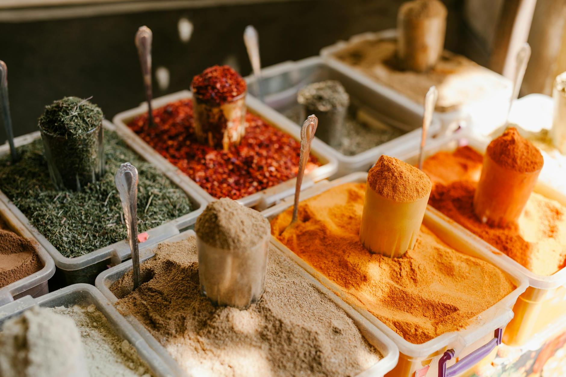 Assorted spices at counter in street market