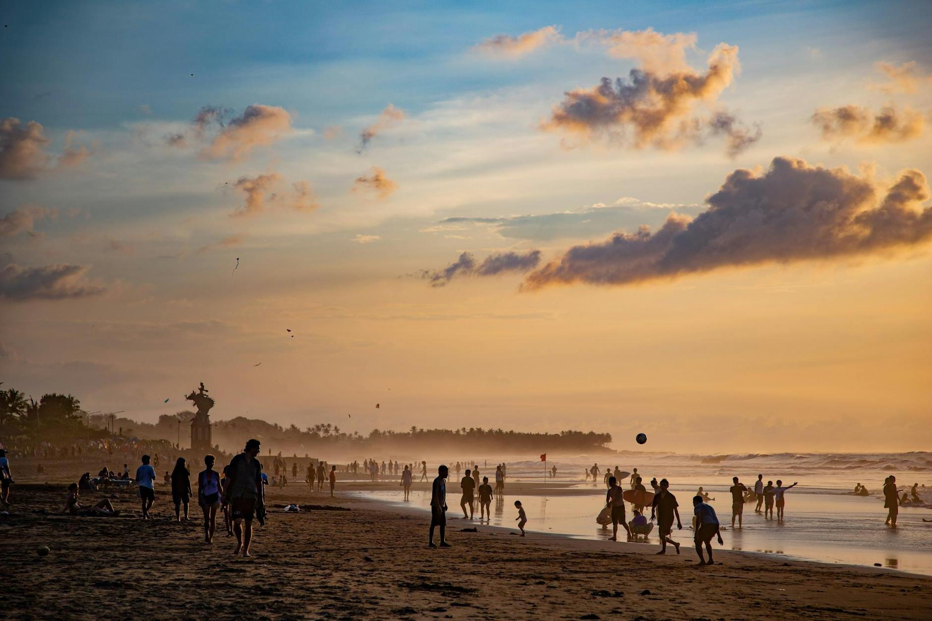 People at the Beach During Sunset