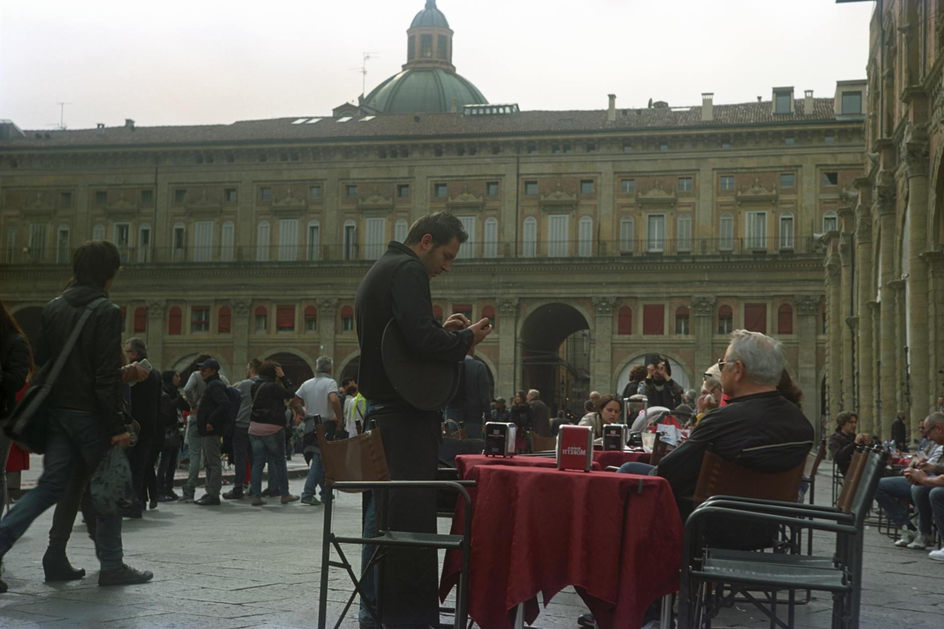 People and Coffee Tables In A Public Square