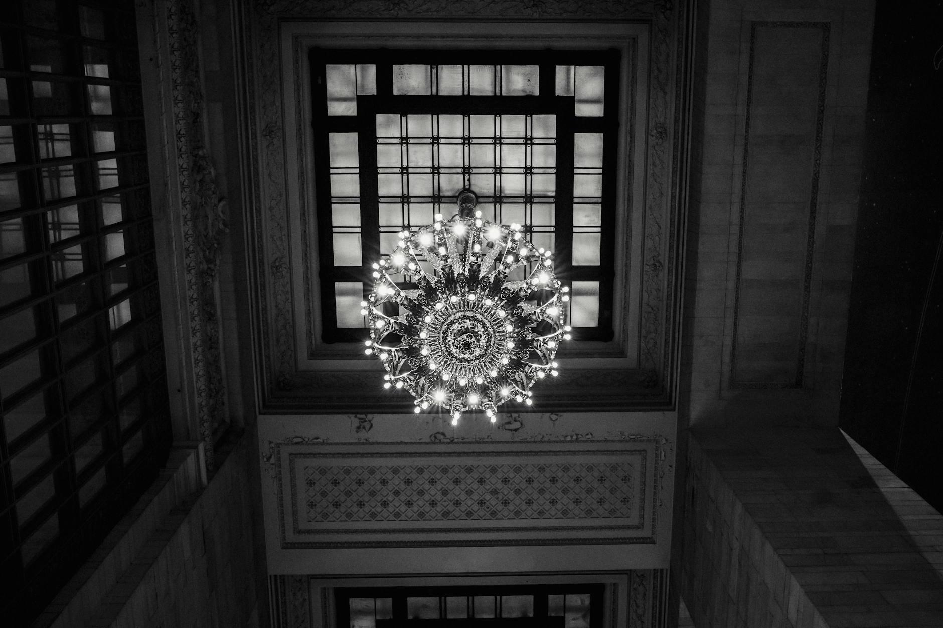 Classic ceiling with chandelier and window