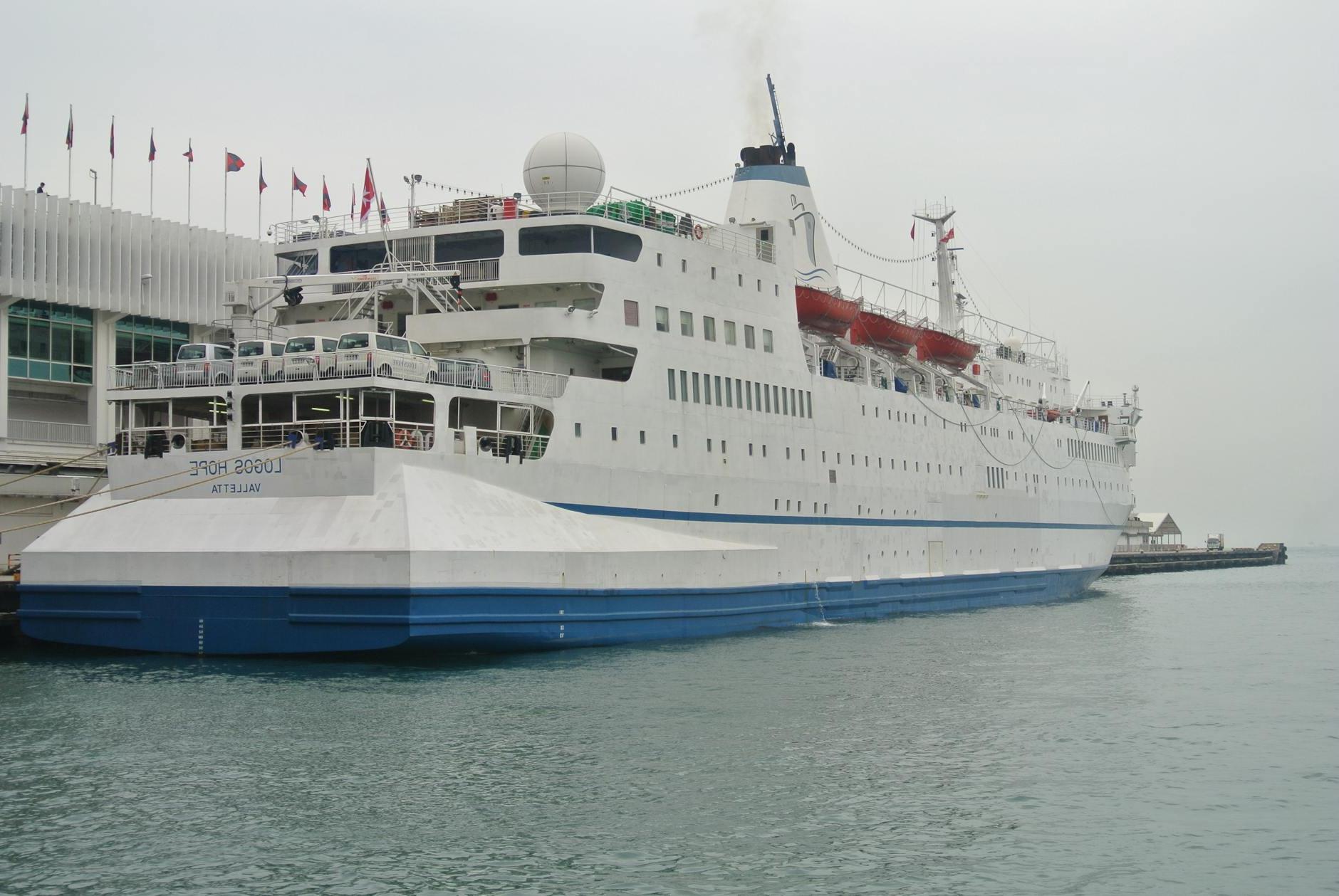 A Ferry Docked at a Passenger Terminal