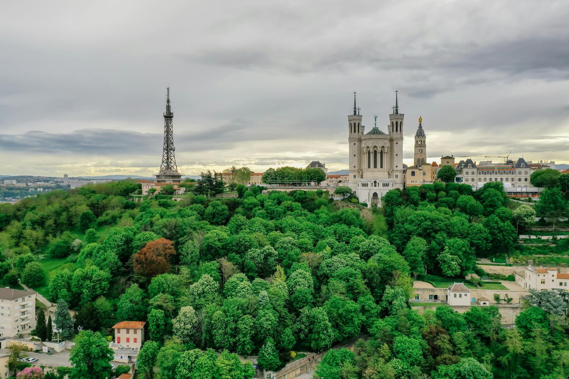 Basilica of Notre-Dame de Fourvière and Metallic tower of Fourviere on a Hill in Lyon