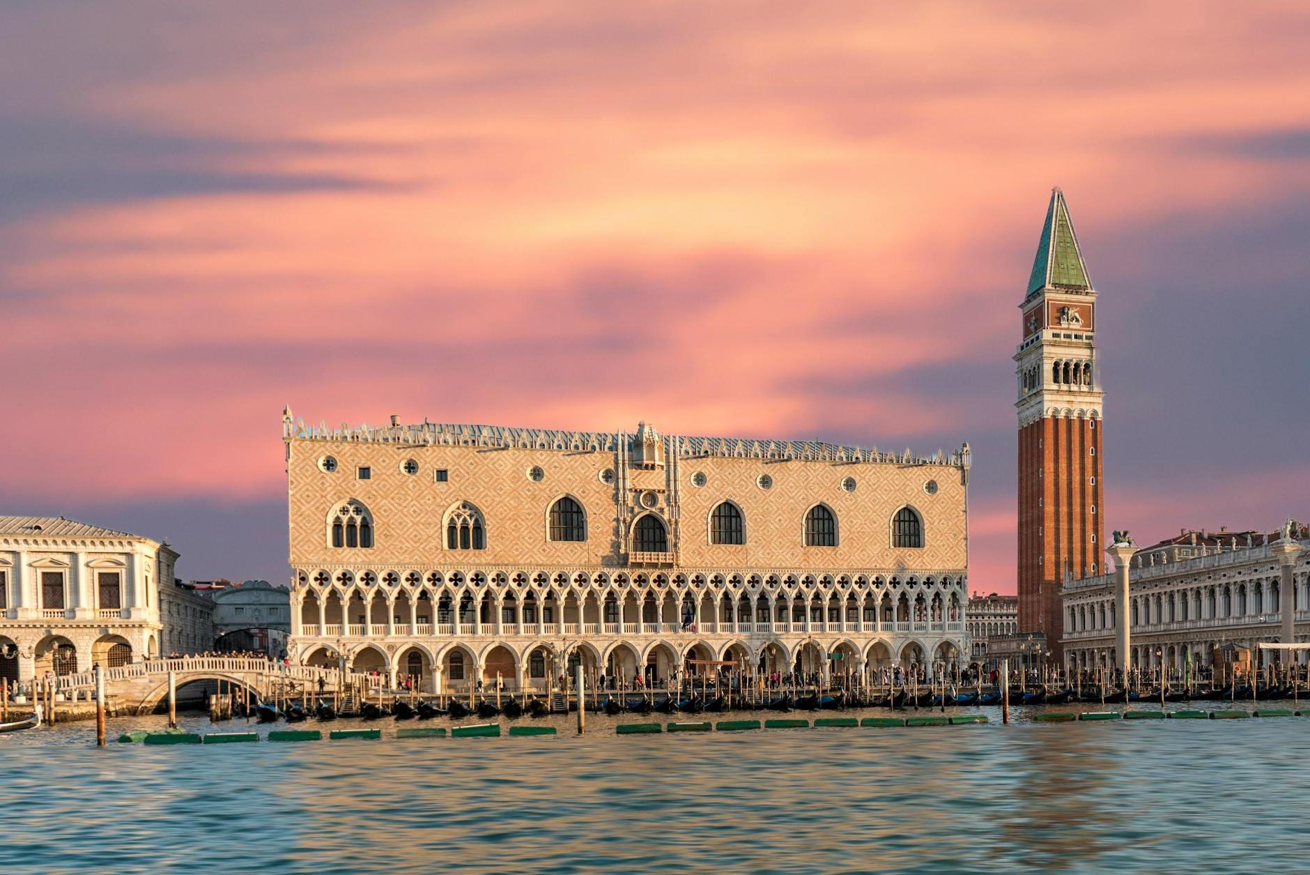 Brown Building With Body of Water