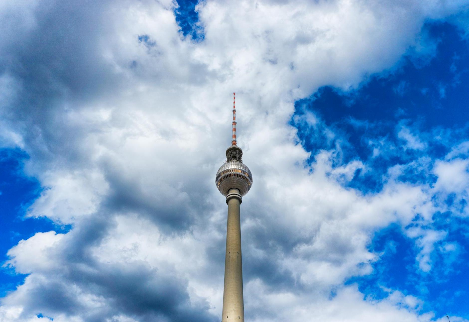 Needle Tower Above White Clouds during Daytime