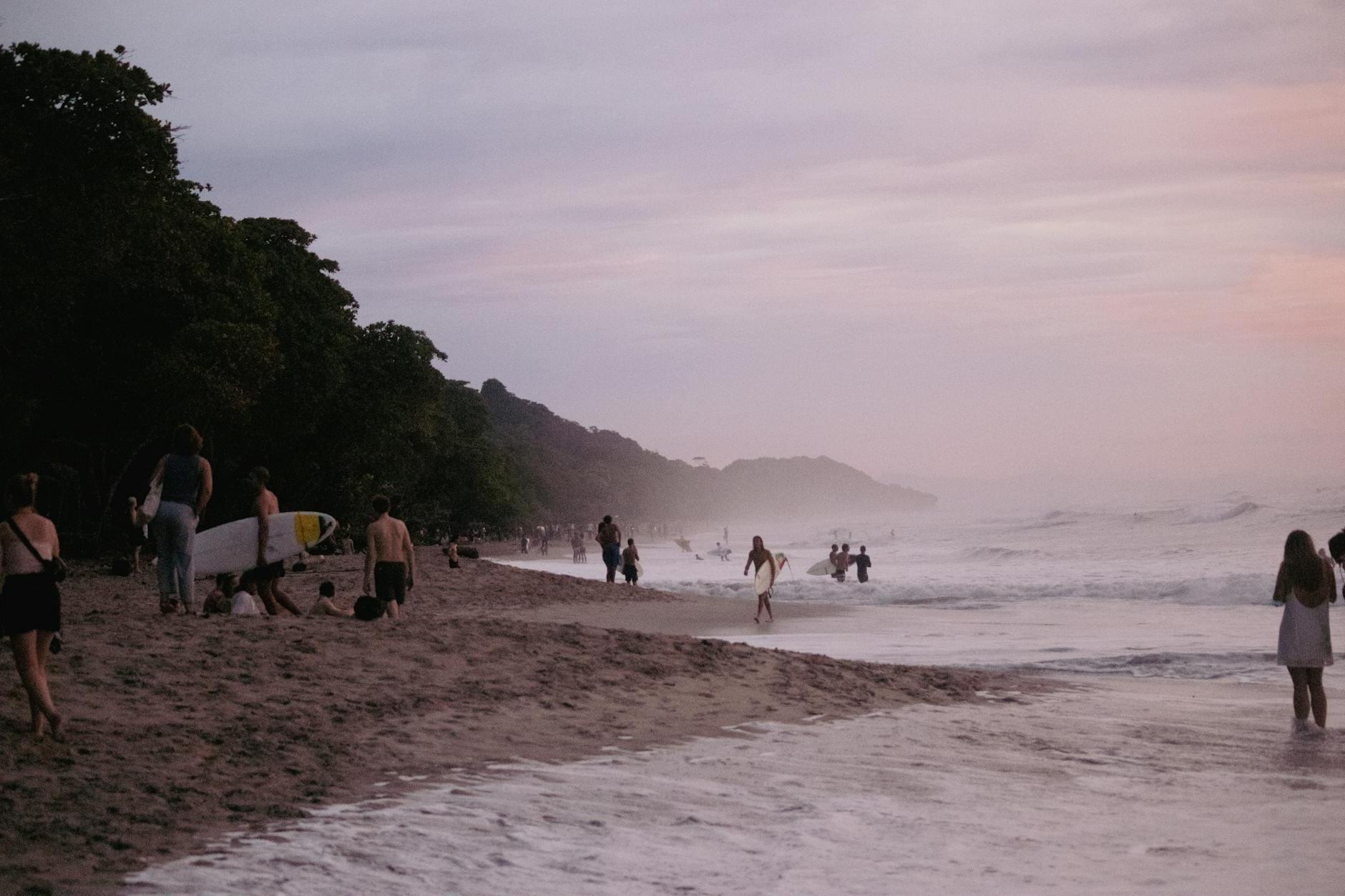 People on Beach during Sunset