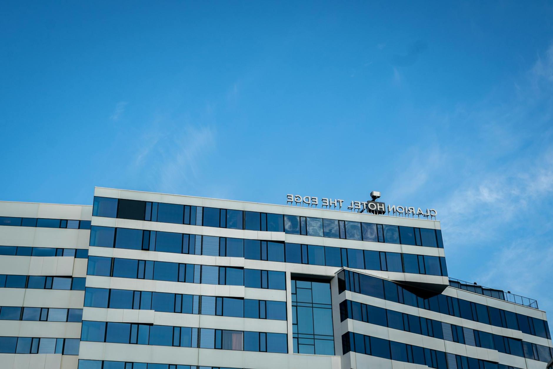 Glass Building Under the Blue Sky